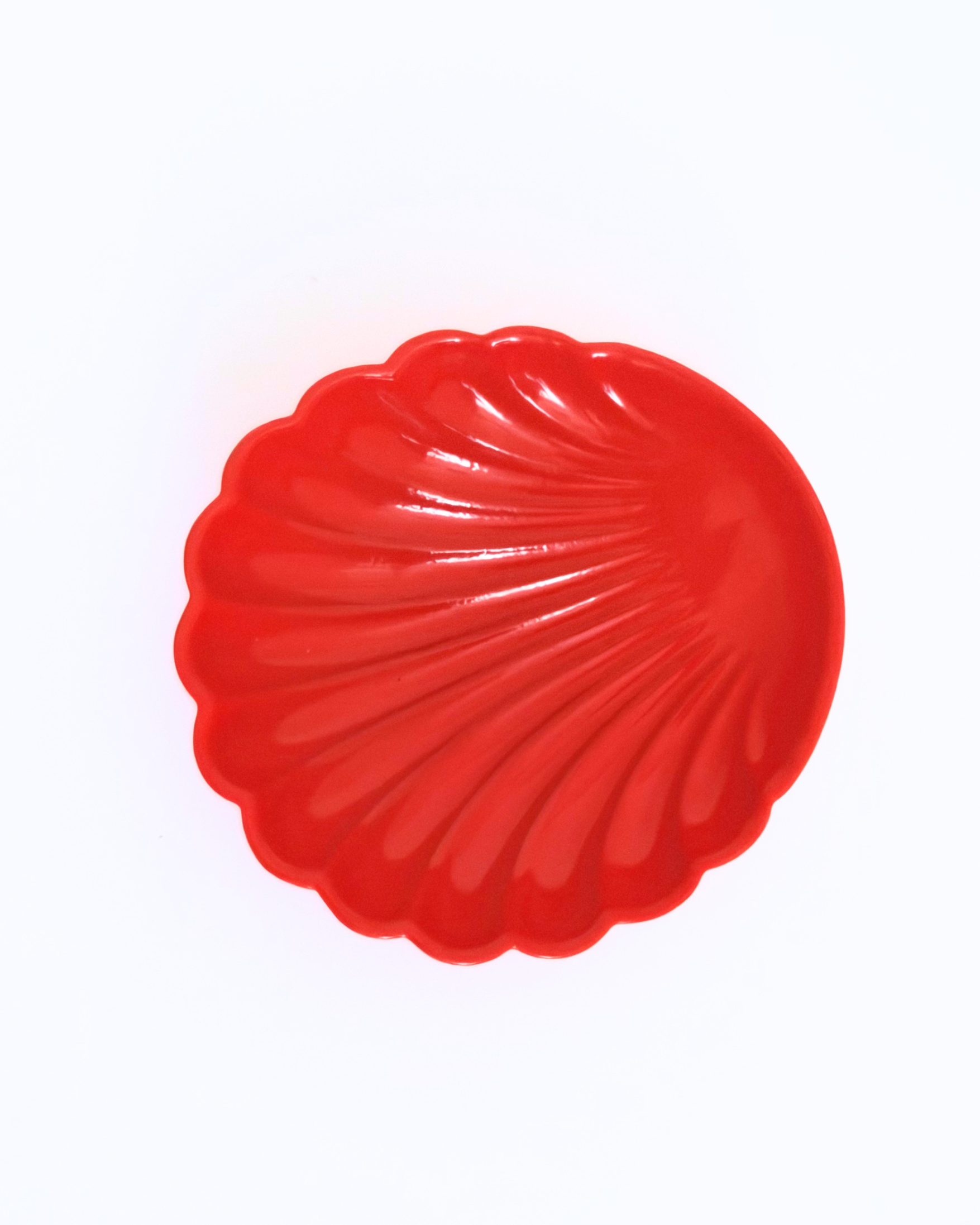 VIDE POCHE ROUGE PIQUE UN FARD